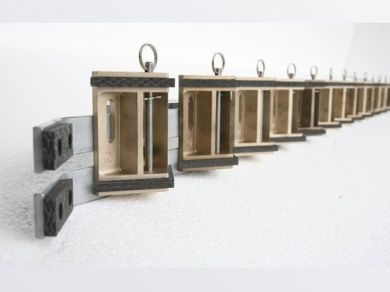 Barra empilhadeira de compósito carbono/carbono produzido pela Mersen para manuseio de vidro quente